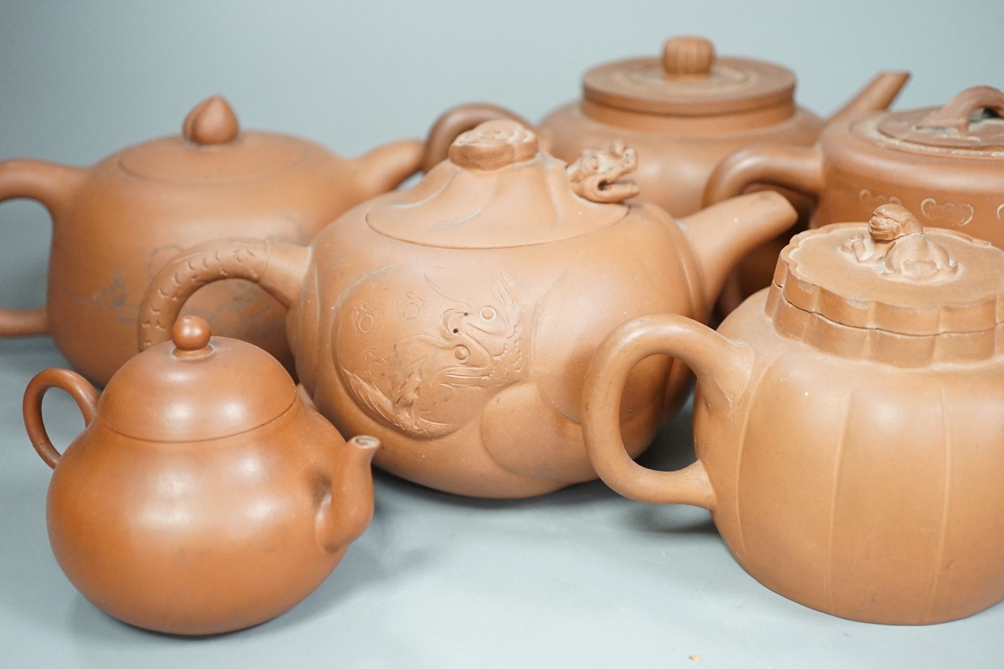 Six Chinese Yixing teapots, tallest 11cm